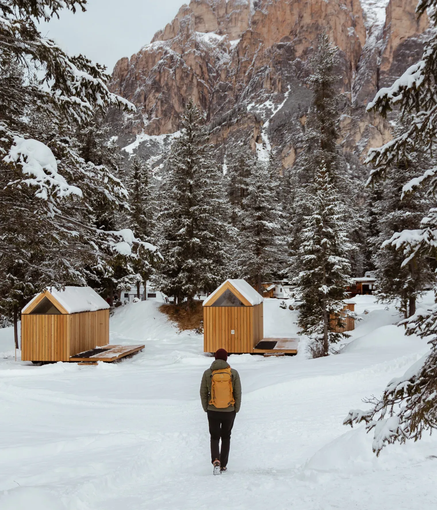 Man with yellow Osprey backpack