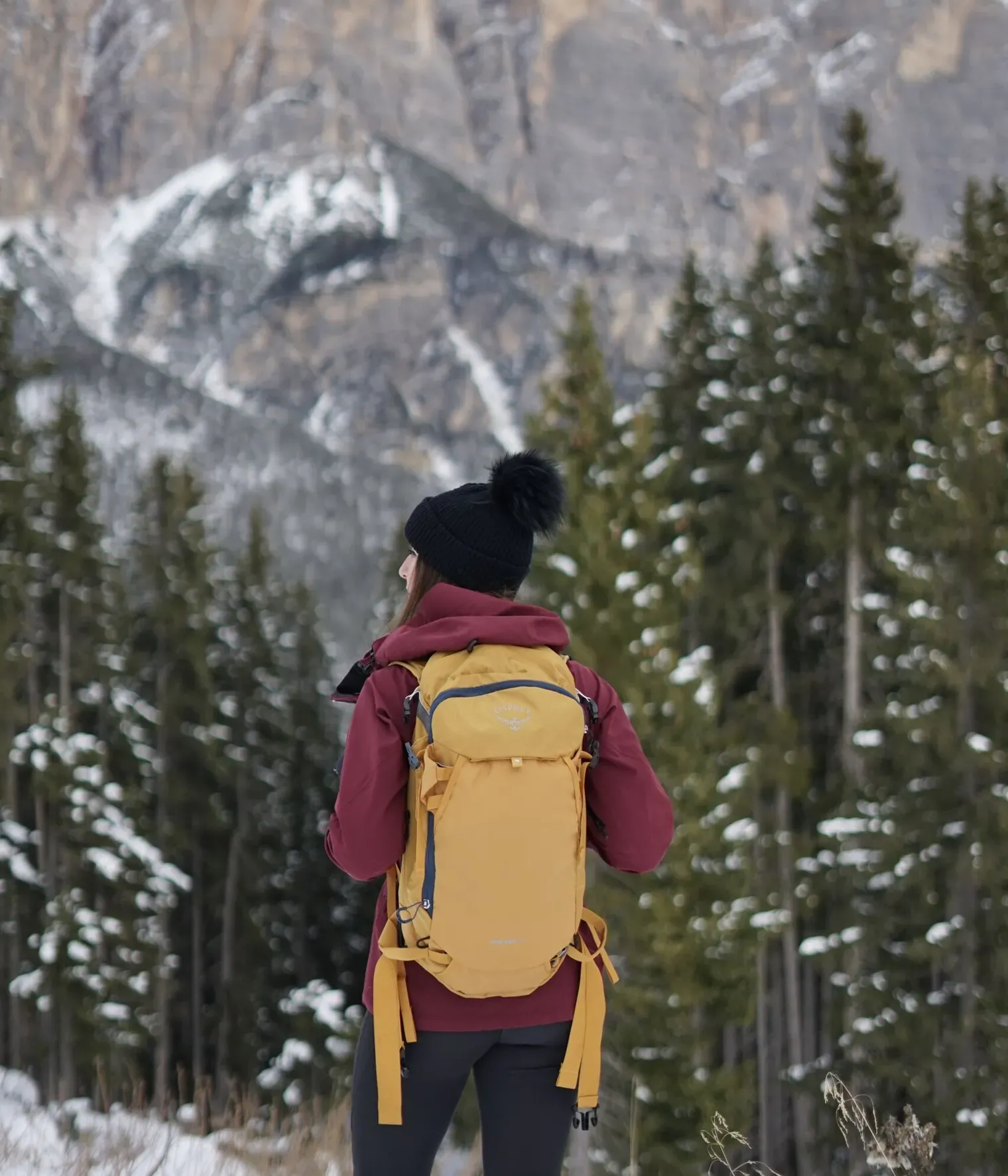 Girl with yellow Osprey backpack
